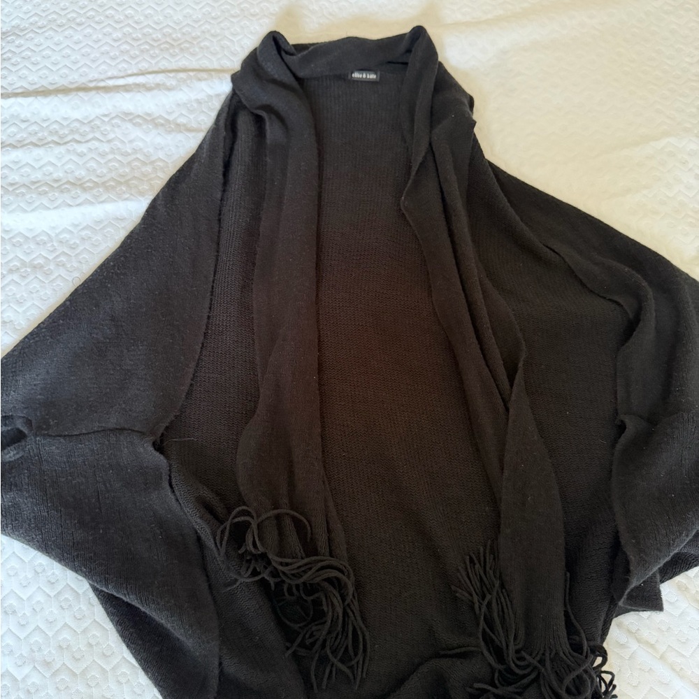 Chic Black Poncho with Fringe by [Brand]